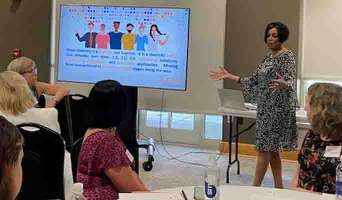 Andrea presneting for a DEI team