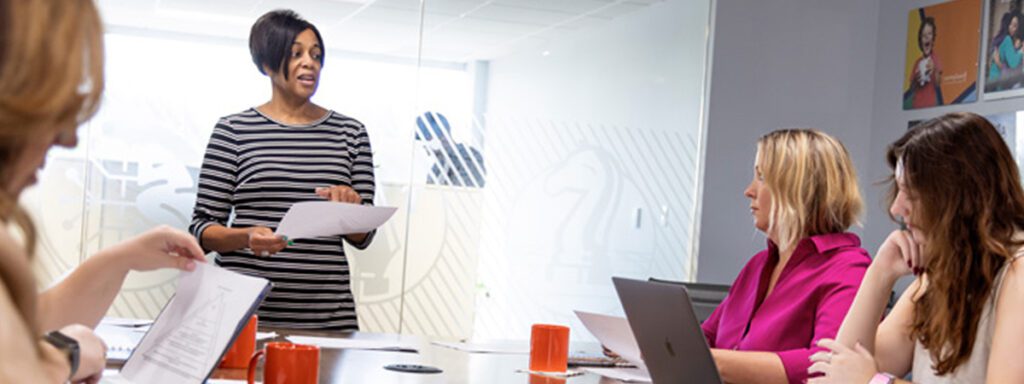 Andrea presenting to a team