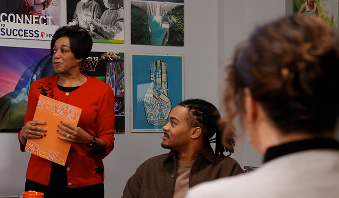 Dr. Hendricks leads a Marketing Meeting